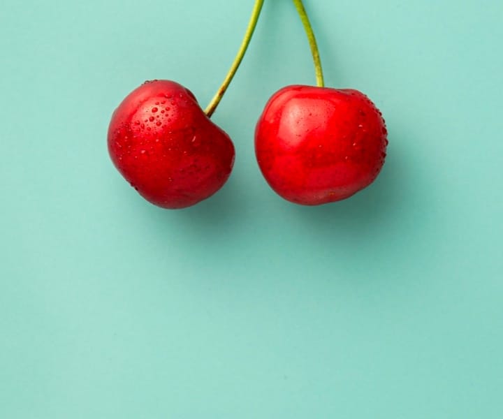 Two red cherries