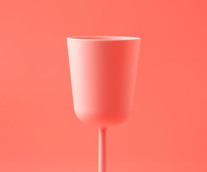 A red stemmed cup